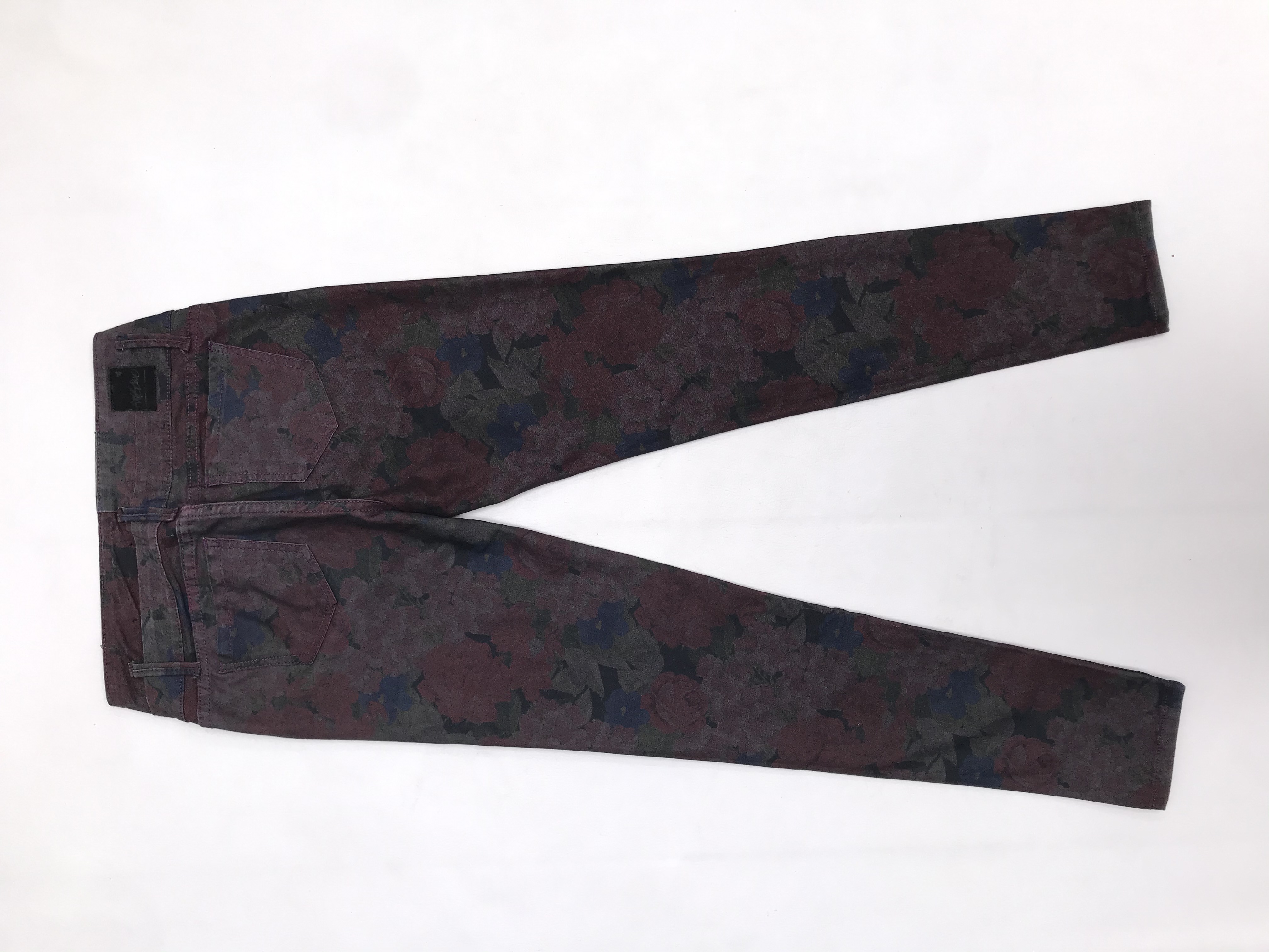 Pantalón pitillo Mossimo, jean con estampado de flores, pretina con dos cortes, bolsillos laterales y posteriores