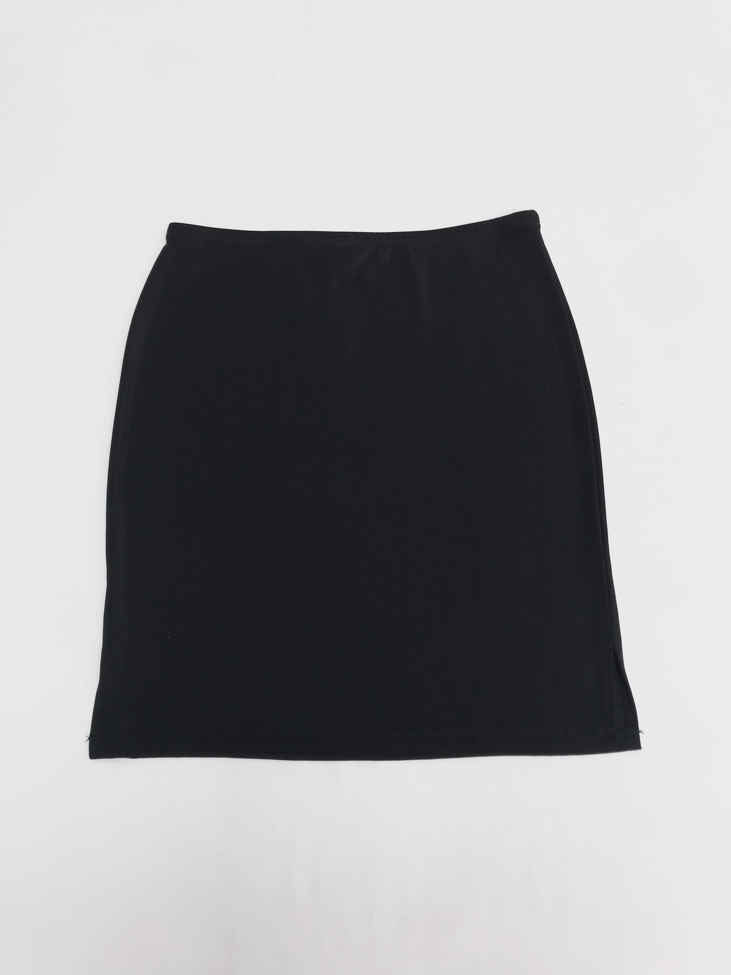 Falda negra stretch con textura de hilo. Largo 48cm
Talla S/M