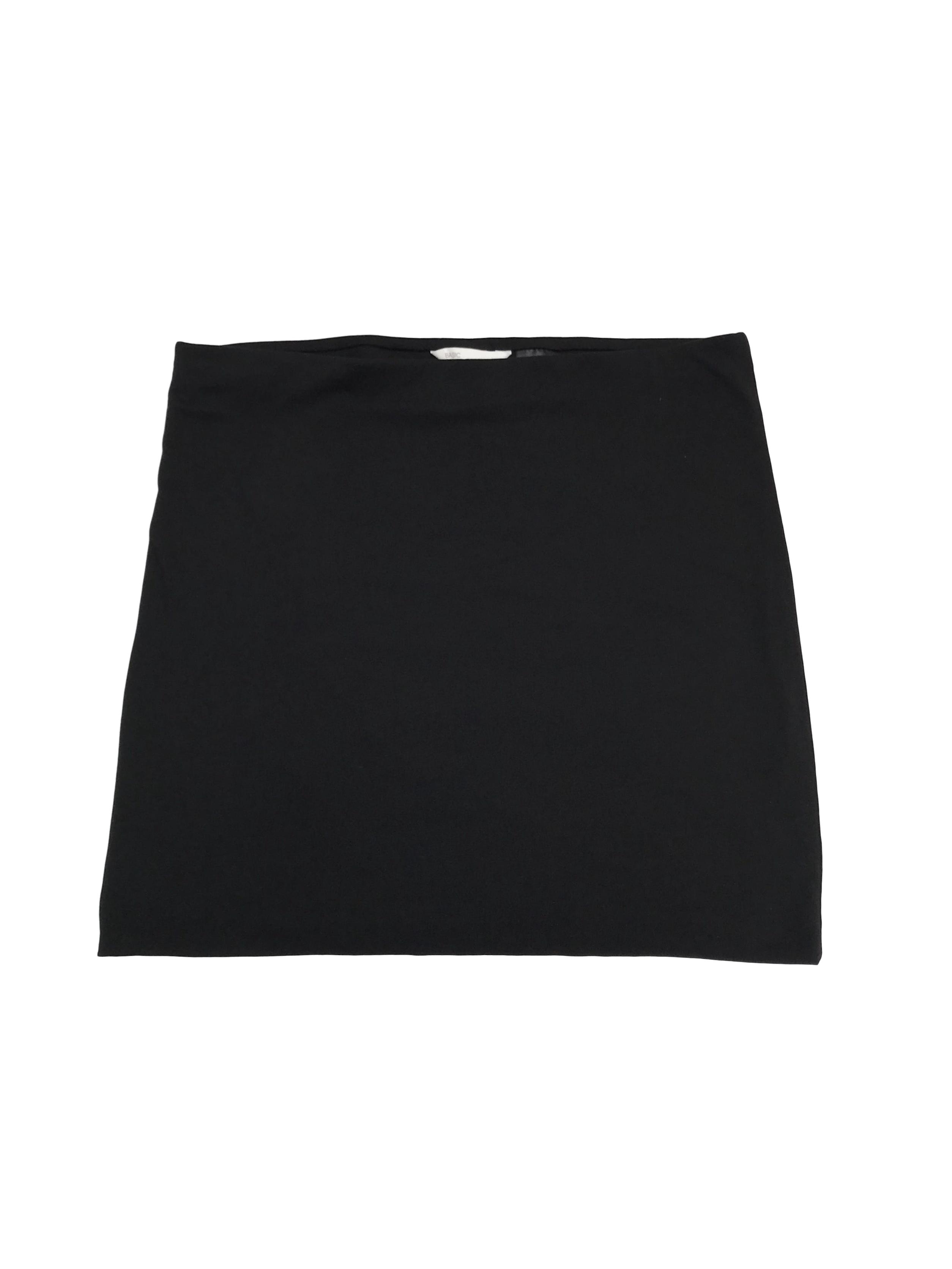 Falda H&M negra de dos capas de algodón ligeramente stretch y elástico en la cintura. Largo 40cm. ¡Básica en todo closet!