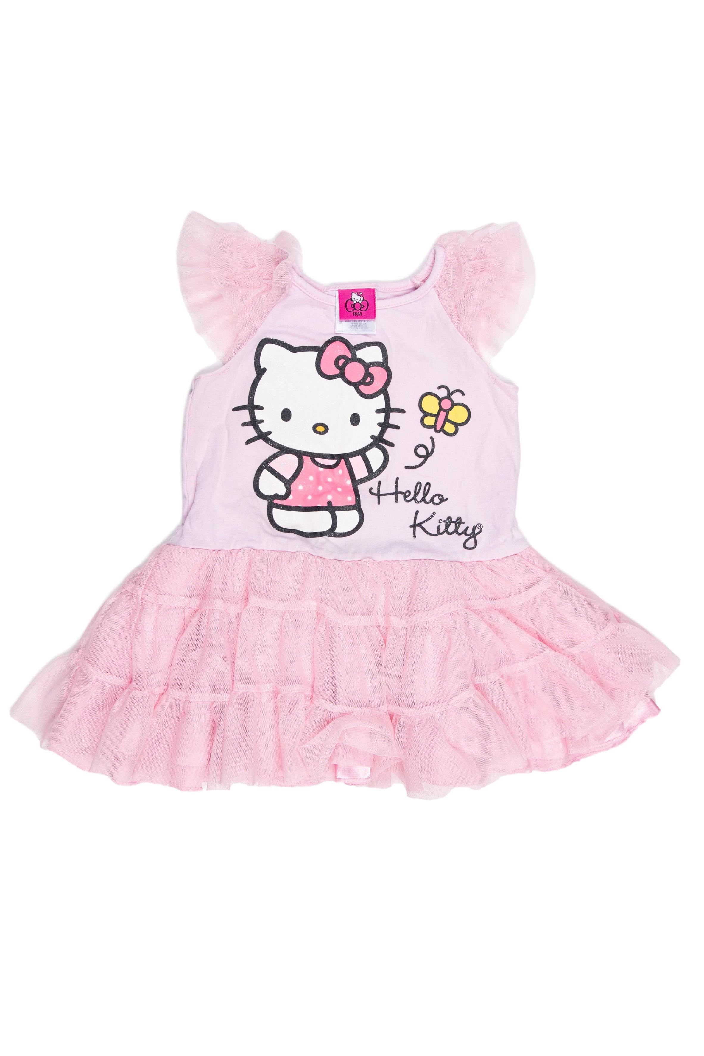 Vestido rosado 97% algodón, 3% spandex con tul. Viene con calzoncitoen en juego. Estado 7/10 depero hacemos una excepción por que sabemos que hará felíz a aluna mini - fan de Hello Kitty. - Hello Kitty By Sanrio