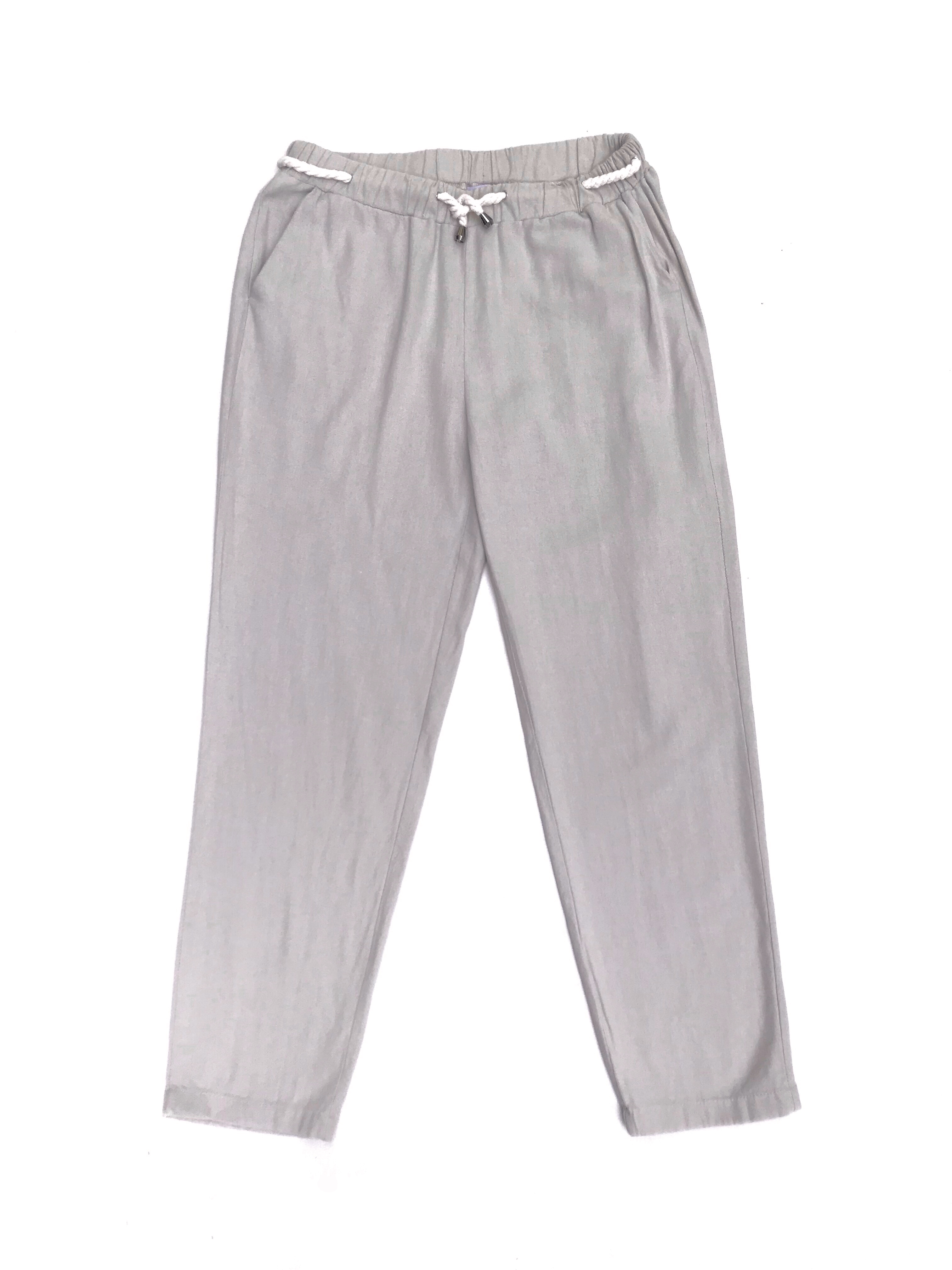 Pantalón Not beige de tela tipo lino con bolsillos laterales, con elástico y cordón en la cintura. Ideal para primavera/verano. Precio original S/ 129