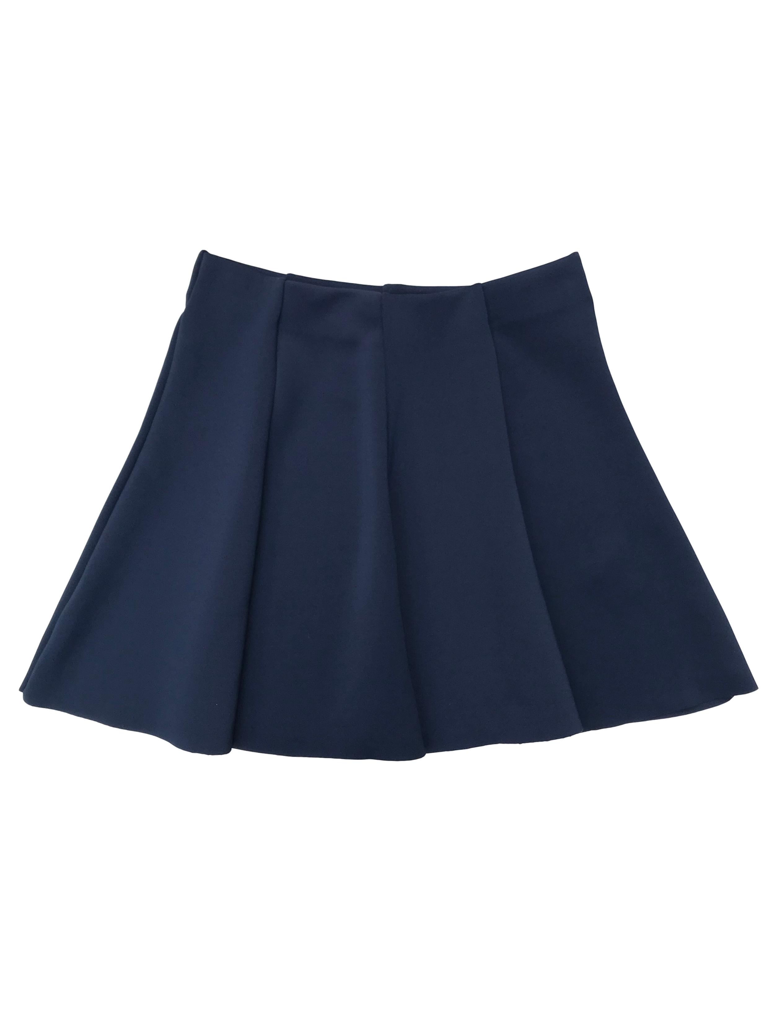Falda azul tela tipo neopreno, corte campana, con elástico en la cintura. Pretina 68cm (sin estirar) Largo 40cm