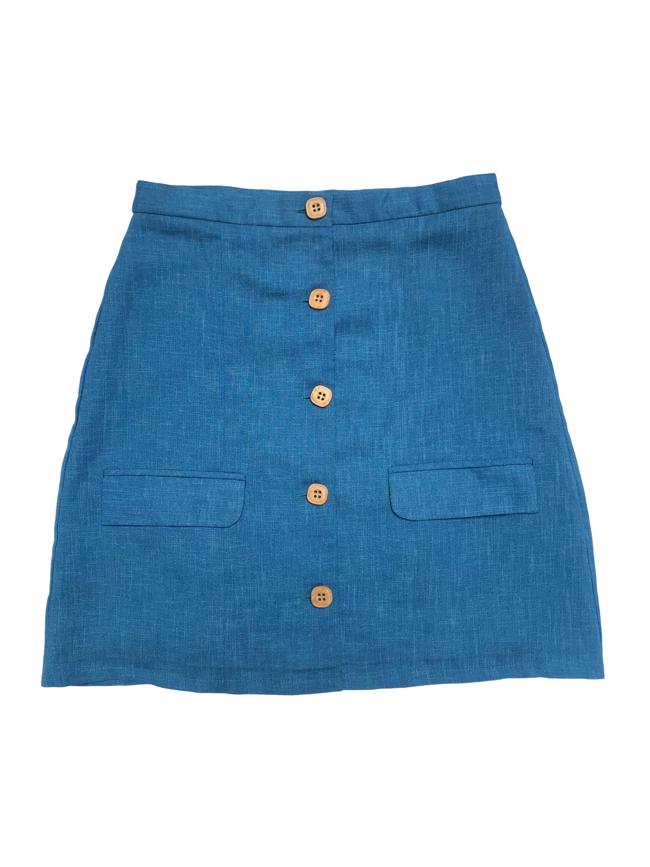 Falda vintage upcycled azul tipo lino , fila de botones de madera al centro, lleva forro. Cintura 74cm Largo 50cm