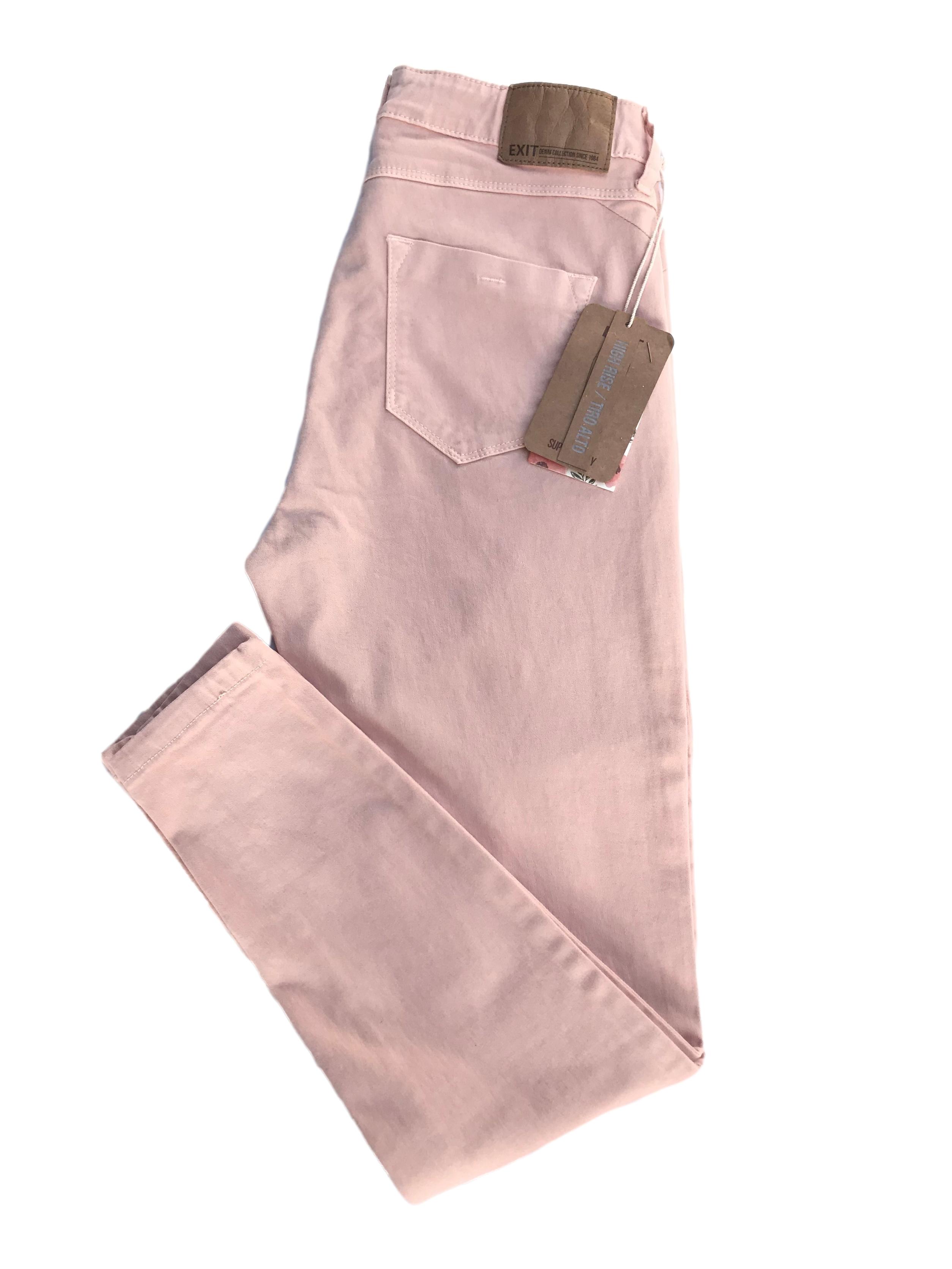 Skinny jean Exit en tono melón, a la cintura, five pocket, 98% algodón con spandex. Cintura 70cm sin estirar Largo 90cm. Nuevo con etiqueta