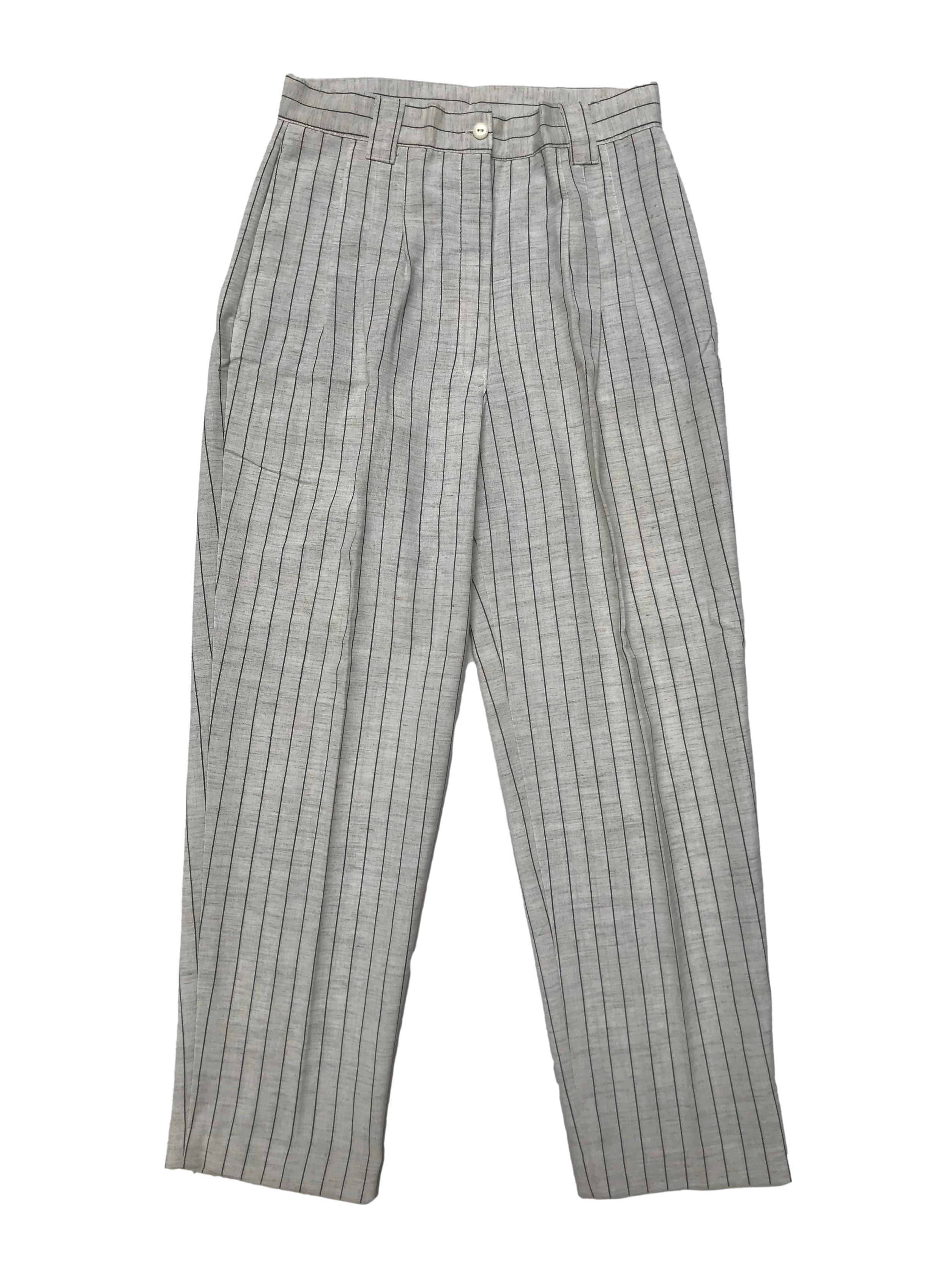 Pantalón vintage crema con líneas grises, pliegues delanteros estilo slouchy, tiene bolsillos laterales. Cintura 72cm Largo 96cm