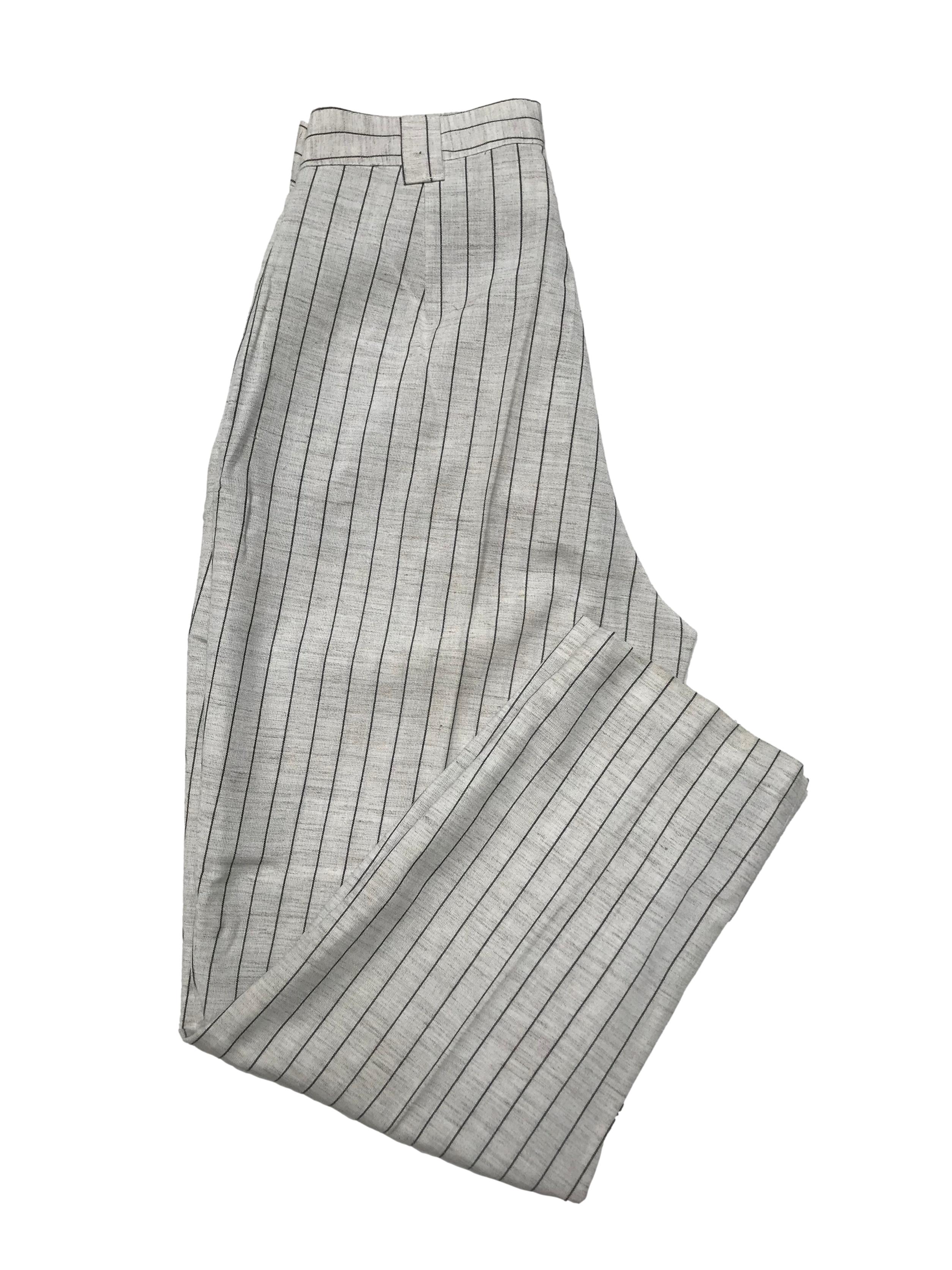Pantalón vintage crema con líneas grises, pliegues delanteros estilo slouchy, tiene bolsillos laterales. Cintura 72cm Largo 96cm