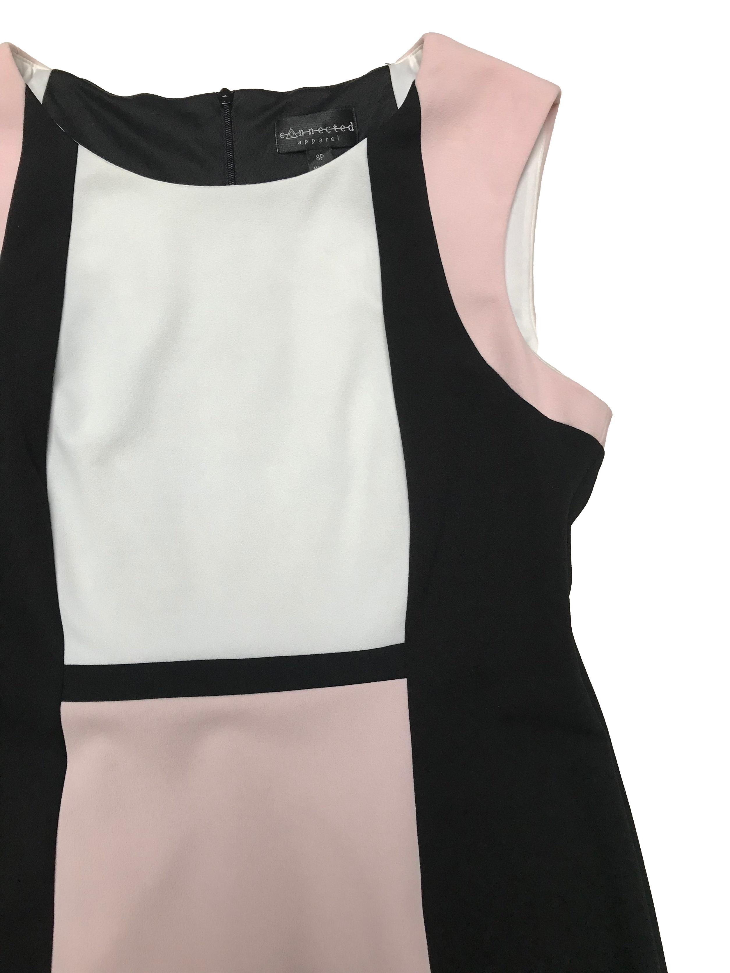 Vestido Connected Apparel estilo sastre negro con zonas rosa y blancas, es stretch, tiene forro hasta la cintura y cierre invisible posterior. Busto 100cm sin estirar Cintura 80cm Largo 90cm. Precio original S/ 250