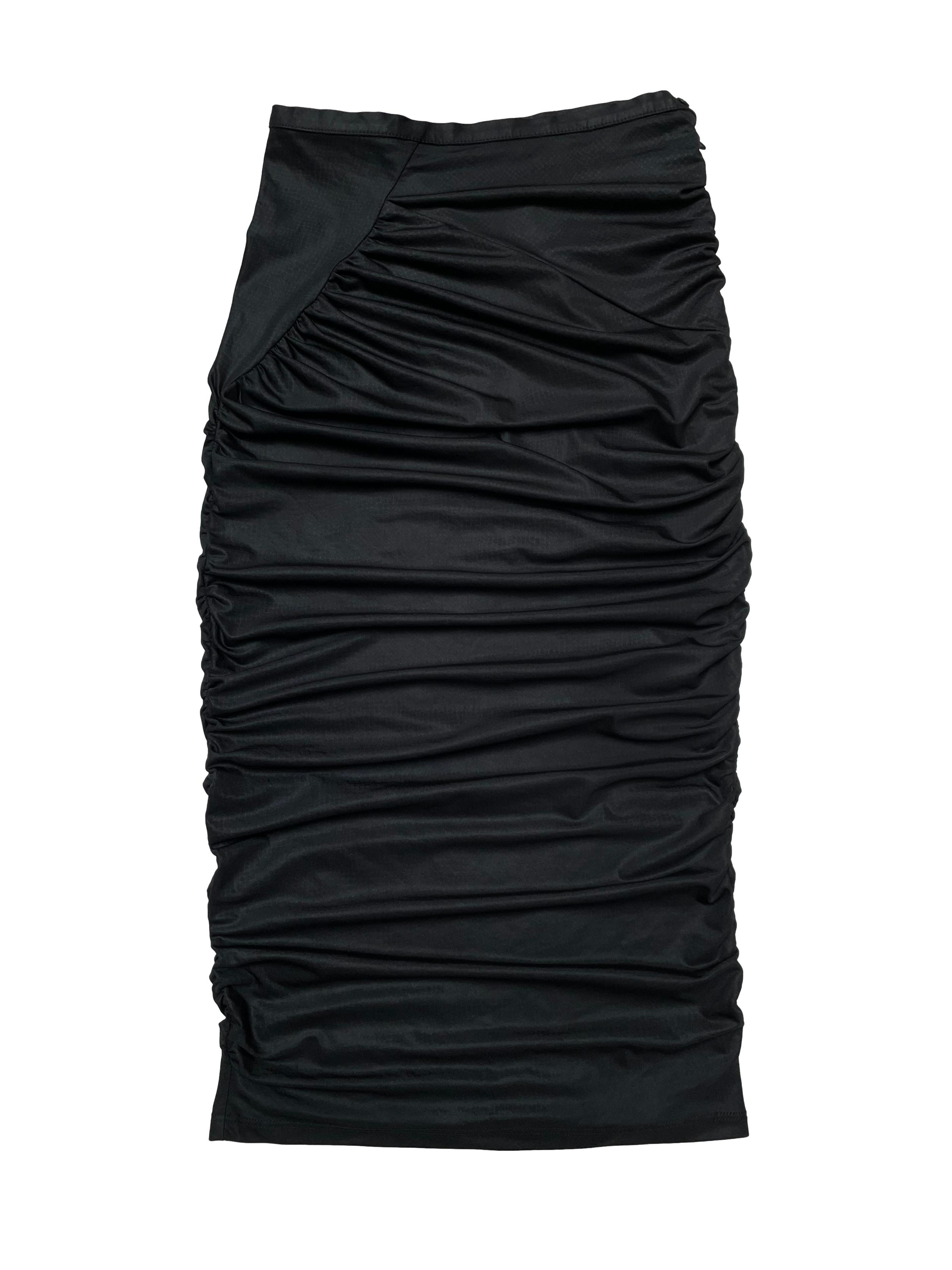 Falda midi Michelle Belau, corte tubo con drapeados, tiene cierre lateral. Cintura 70cm Largo 70-75cm (depende de qué tanto uses el drapeado)